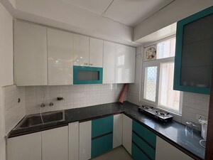 Kitchen in 2 BHK Apartment at Shree Vardhman Green Court, Sector 90 – for Rent