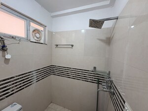 Bathroom in 2 BHK Apartment at Shree Vardhman Green Court, Sector 90 – for Rent
