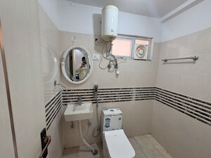 Bathroom in 2 BHK Apartment at Shree Vardhman Green Court, Sector 90 – for Rent