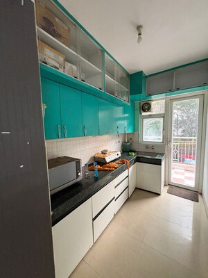 Kitchen in 2 BHK Apartment at Shree Vardhman Green Court, Sector 90 – for Rent