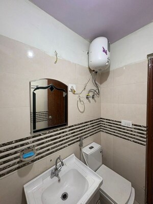 Bathroom in 2 BHK Apartment at Shree Vardhman Green Court, Sector 90 – for Rent