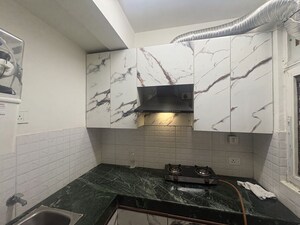 Kitchen in 1 BHK Apartment at Shree Vardhman Green Court, Sector 90 – for Rent
