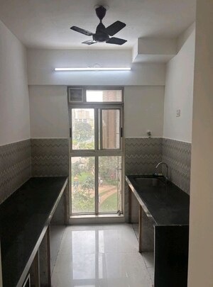 Kitchen in 1.5 BHK Apartment at Lodha Upper Thane, Anjur – for Sale
