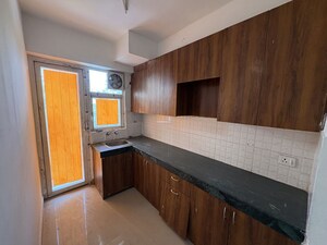 Kitchen in 2 BHK Apartment at Shree Vardhman Green Court, Sector 90 – for Rent