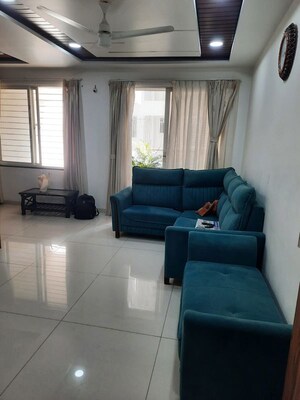 Living Room in 2 BHK Apartment at Bhalerao Savannah Hills, Bavdhan – for Rent