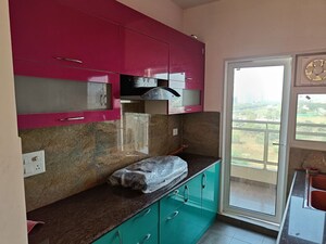 Kitchen in 2 BHK Apartment at Elite Golf Green, Sector 79 – for Rent