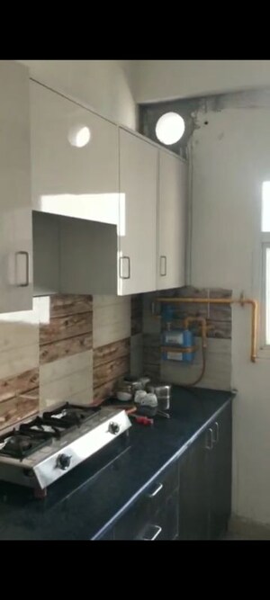 Kitchen in 3 BHK Apartment at Amrapali Enchante, Tech Zone 4 Greater Noida – for Rent