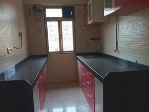Kitchen in 2 BHK Apartment at Cosmos Classique, Ghodbunder Road – for Rent