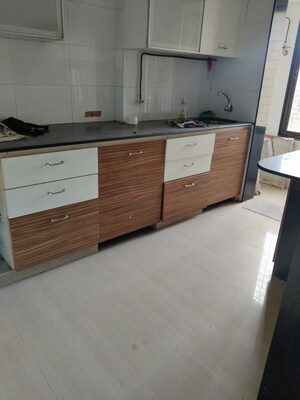 Kitchen in 1 BHK Apartment at Teenmurti Summit, Borivali East – for Rent
