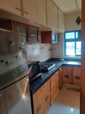 Kitchen in 3 BHK Apartment at Summer Villa, Santacruz East – for Rent