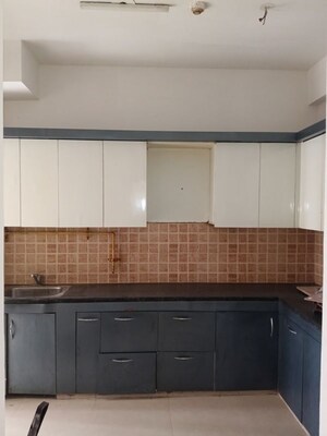 Kitchen in 3 BHK Apartment at Mahagun Mywoods II, Sector 16c Greater Noida – for Rent