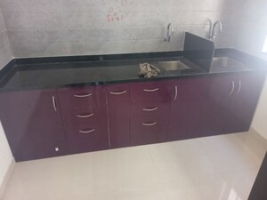 Kitchen in 1 BHK Apartment at Roshan Milestone, Tathawade – for Rent
