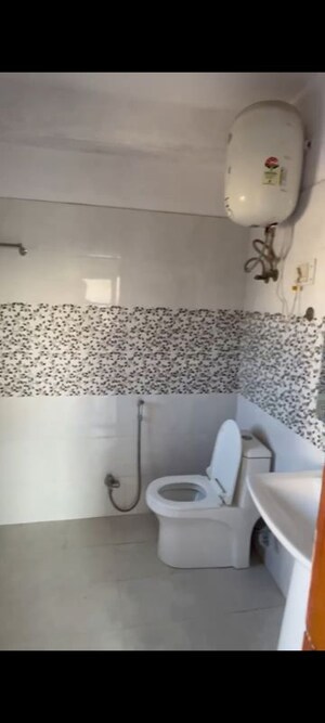 Bathroom in 3 BHK Builder Floor at Freedom Fighters Enclave – for Rent