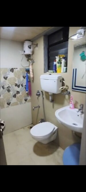 Bathroom in 2 BHK Apartment at Raunak City, Kalyan West – for Sale