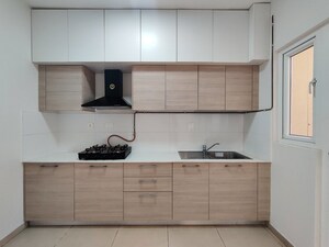 Kitchen in  Apartment at Bhartiya Nikoo Homes Phase 2, Thanisandra Main Road – for Rent