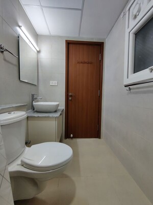 Bathroom in  Apartment at Bhartiya Nikoo Homes Phase 2, Thanisandra Main Road – for Rent