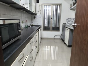Kitchen in 2.5 BHK Apartment at Oberoi Realty Woods, Goregaon East – for Rent