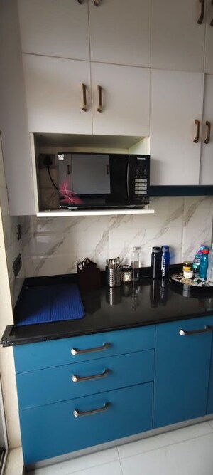 Kitchen in 2 BHK Apartment at Vijay Galaxy, Waghbil – for Sale