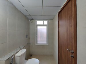 Bathroom in 3 BHK Apartment at Bhartiya City Nikoo Homes 4, Thanisandra Main Road – for Sale