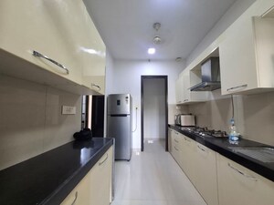 Kitchen in 2 BHK Apartment at Lodha Luxuria, Majiwada – for Rent