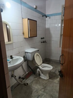 Bathroom in 3 BHK Apartment at Shipra Suncity, Vaibhav Khand – for Rent