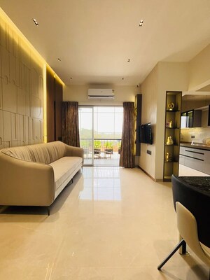 Living Room in 1 BHK Apartment at Tharwani Meghna Montana, Ambernath West – for Sale