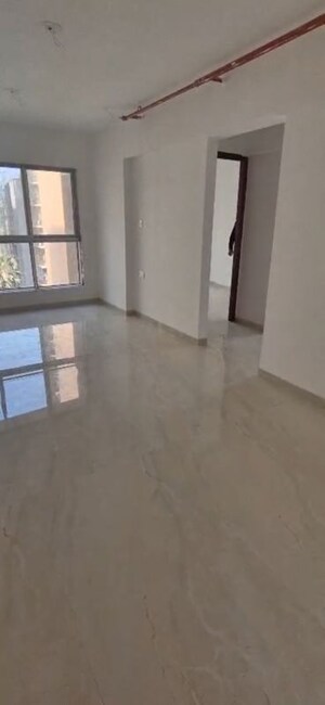 Living Room in 2 BHK Apartment at Infinity Paradise CHS, Goregaon West – for Rent