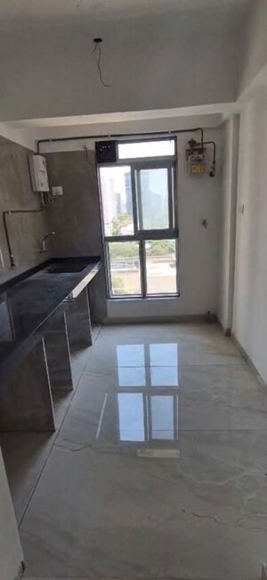 Kitchen in 2 BHK Apartment at Infinity Paradise CHS, Goregaon West – for Rent
