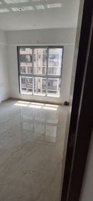 Bedroom in 1 BHK Apartment at Infinity Paradise CHS, Goregaon West – for Rent