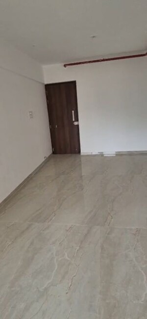 Room in 1 BHK Apartment at Infinity Paradise CHS, Goregaon West – for Rent