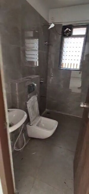 Bathroom in 1 BHK Apartment at Infinity Paradise CHS, Goregaon West – for Rent