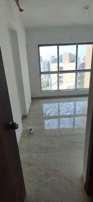 Master Bedroom in 3 BHK Apartment at Infinity Paradise CHS, Goregaon West – for Rent