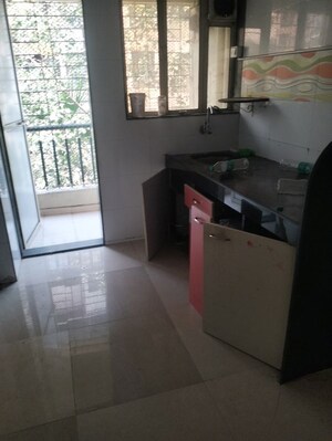 Kitchen in 1 BHK Apartment at Mahadev Complex, Mira Road – for Rent
