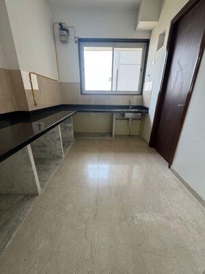Kitchen in 1 BHK Apartment at Iris CHS, Kasarvadavali – for Rent