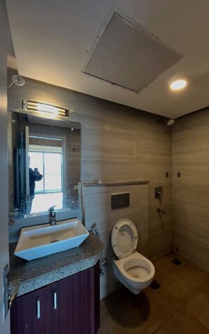 Bathroom in 2 BHK Apartment at Paras Dews, Sector 106 – for Rent