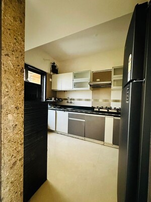 Kitchen in 1 BHK Apartment at Raunak Heights, Ghodbunder Road – for Rent