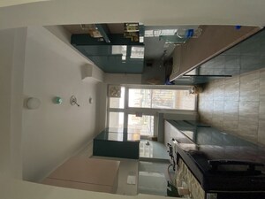 Kitchen in 2.5 BHK Apartment at Amrapali Leisure Park, Amrapali Leisure Valley – for Rent