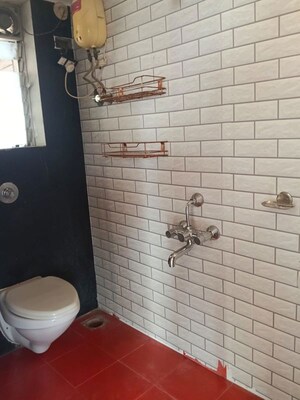 Bathroom in 2 BHK Apartment at Ratnagar CHS, Andheri West – for Sale