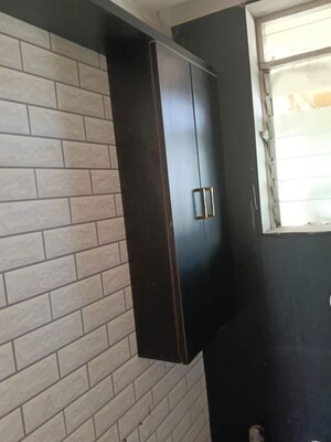Building Lobby in 2 BHK Apartment at Ratnagar CHS, Andheri West – for Sale