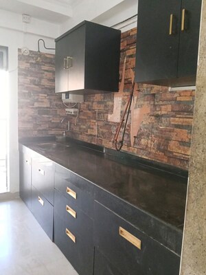 Kitchen in 2 BHK Apartment at Ratnagar CHS, Andheri West – for Sale