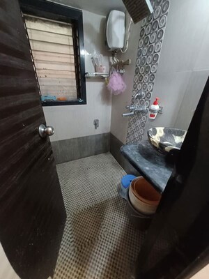 Bathroom in 1 BHK Apartment at Haware Estate, Kasarvadavali – for Rent
