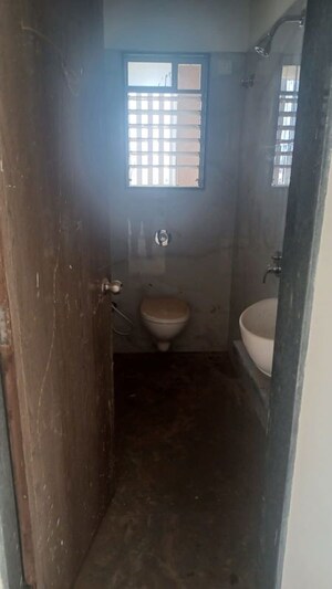 Bathroom in 1 BHK Apartment at Raunak Heights, Ghodbunder Road – for Rent