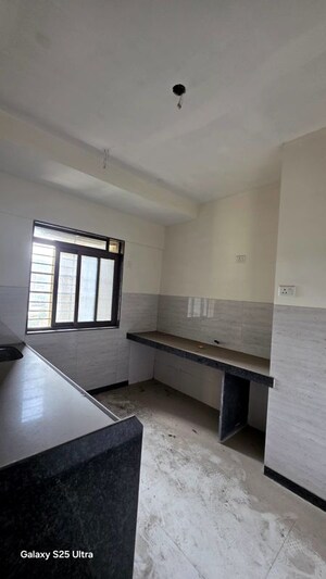 Kitchen in 2 BHK Apartment at Acme Ozone Phase II, Manpada – for Sale