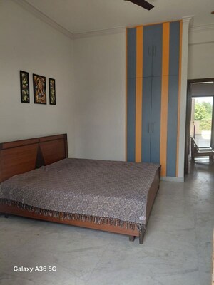 Bedroom in 4 BHK Builder Floor at Sector 15 – for Rent