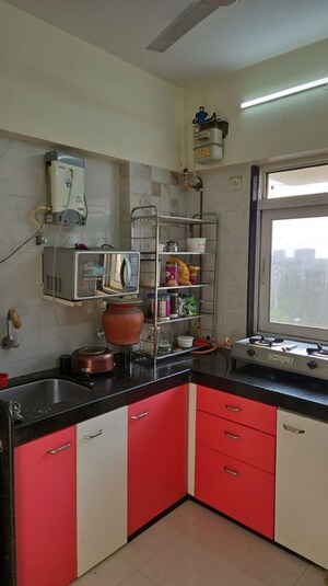 Kitchen in 1.5 BHK Apartment at Zee Manubharati, Andheri West – for Rent