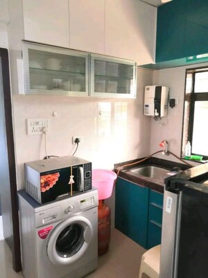 Kitchen in 1 BHK Apartment at Ayyappa Juhu Radhika, Juhu – for Rent