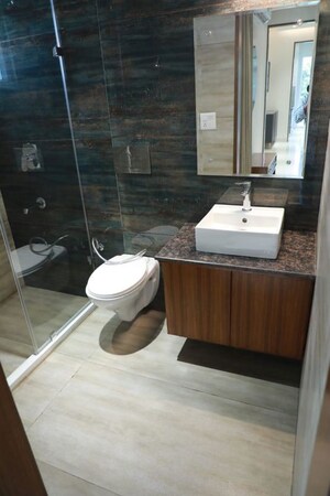 Bathroom in 3 BHK Apartment at Motia Blue Ridge, Dhakoli – for Sale