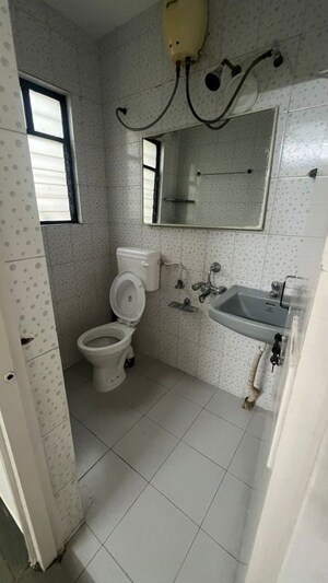 Bathroom in 2 BHK Apartment at Pooja Sankul Apartment, Aundh – for Sale