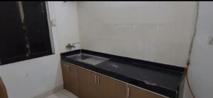 Kitchen in 2 BHK Apartment at Montreal Tower, Andheri West – for Rent