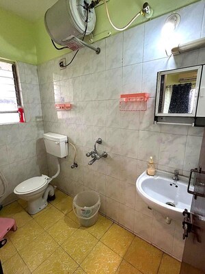 Bathroom in 3 BHK Apartment at Riddhi Enclave Co-op Housing Society Ltd, Viman Nagar – for Rent